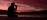 Woman standing arms outstretched on a hilltop at dawn - expansive sunrise sky for healing practitioners