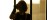 Practitioner silhouette framed in an interior arched opening